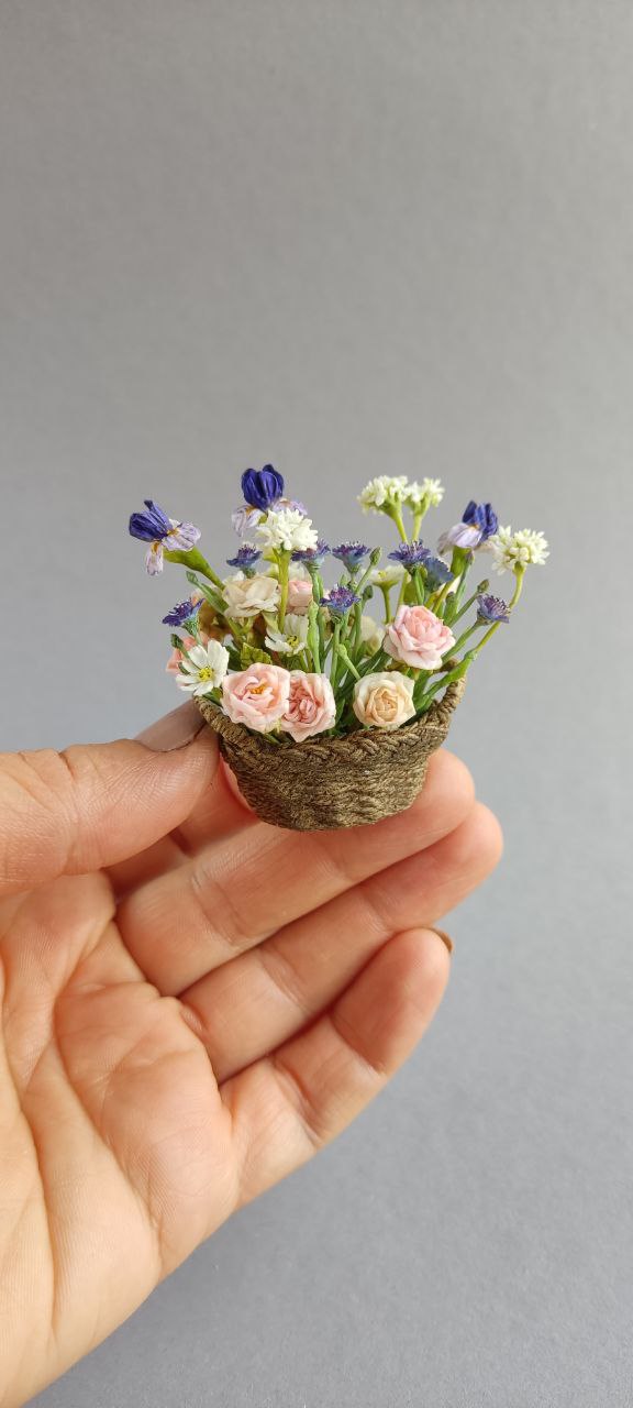 Basket of irises and roses