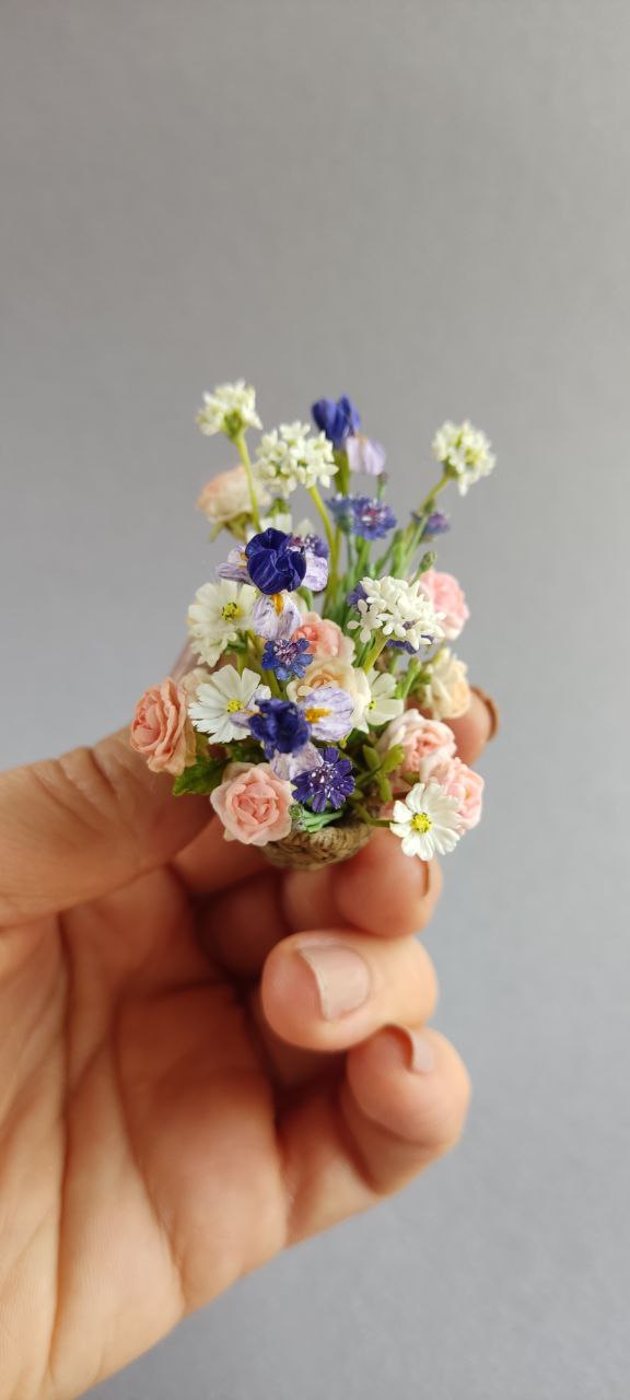 Basket of irises and roses