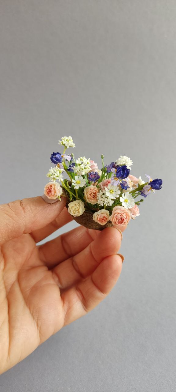 Basket of irises and roses