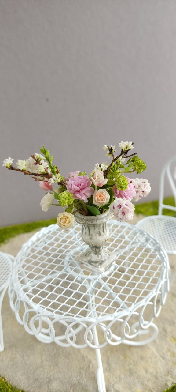 Bouquet in antique vase.