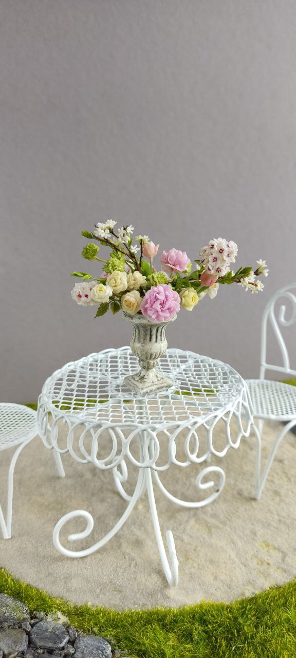 Bouquet in antique vase.