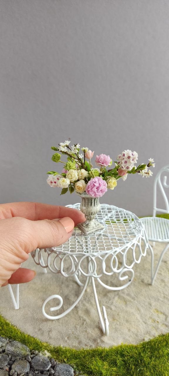 Bouquet in antique vase.