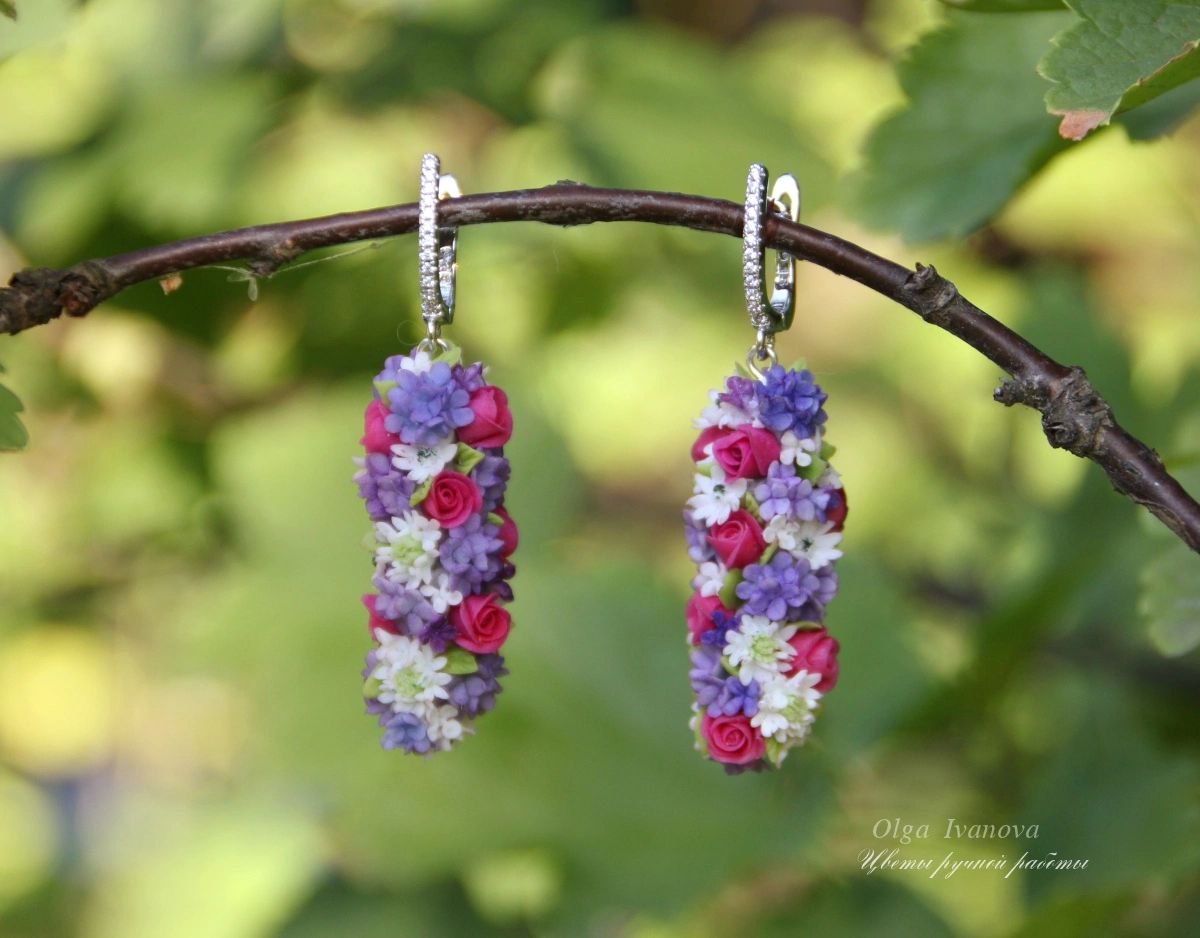 * Long silver earrings with flowers