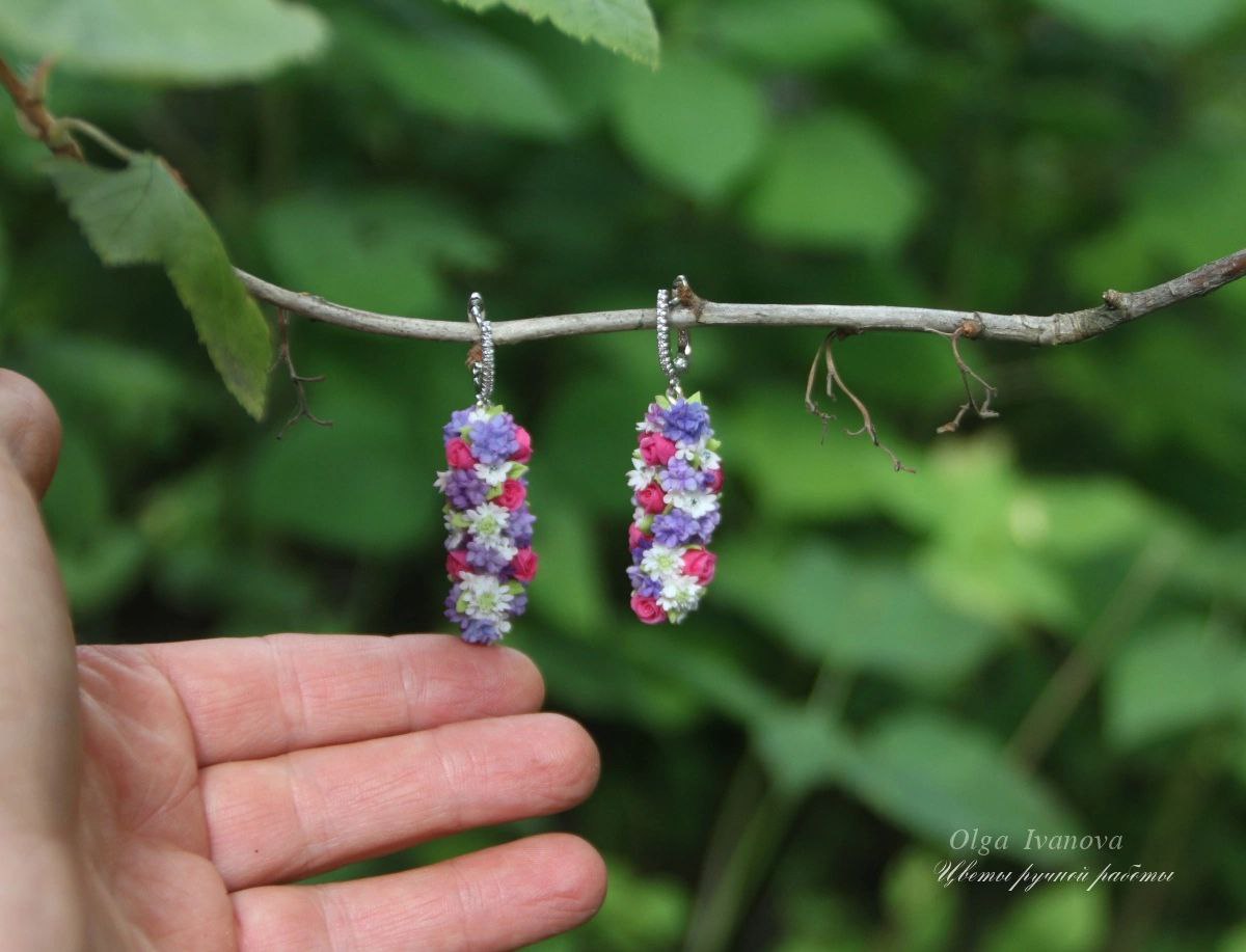 * Long silver earrings with flowers