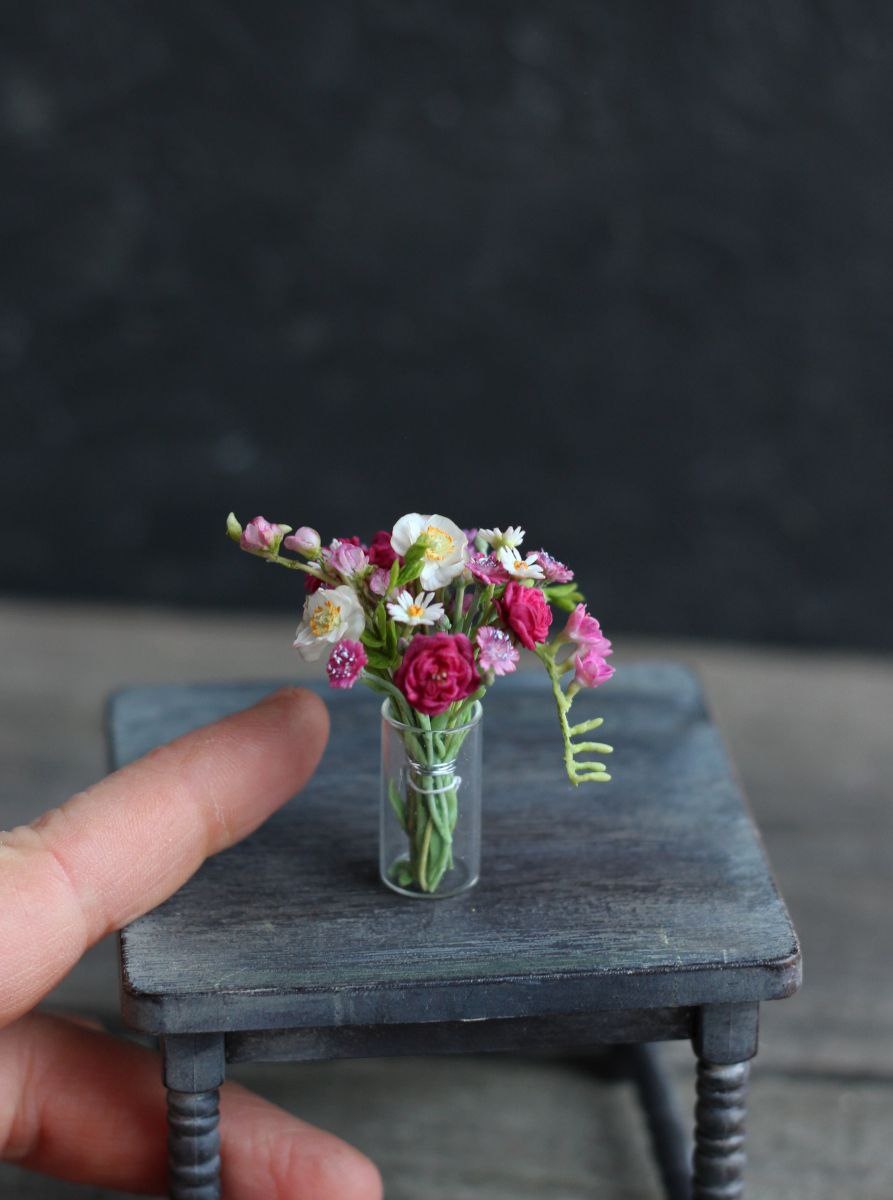 Summer bouquet with peony roses and poppies.