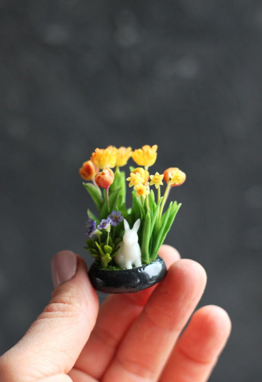 *                    Arrangement with tulips, violet and daffodils