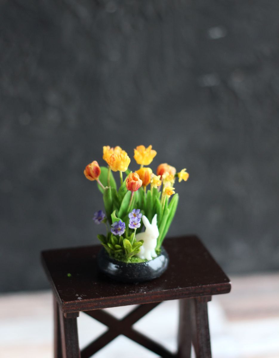 *                    Arrangement with tulips, violet and daffodils