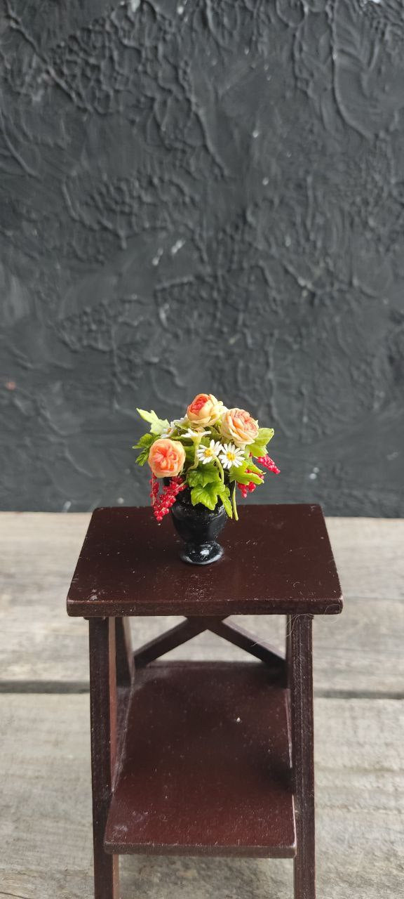*                  Roses, daisies and red currants. Bouquet in a classic vase.