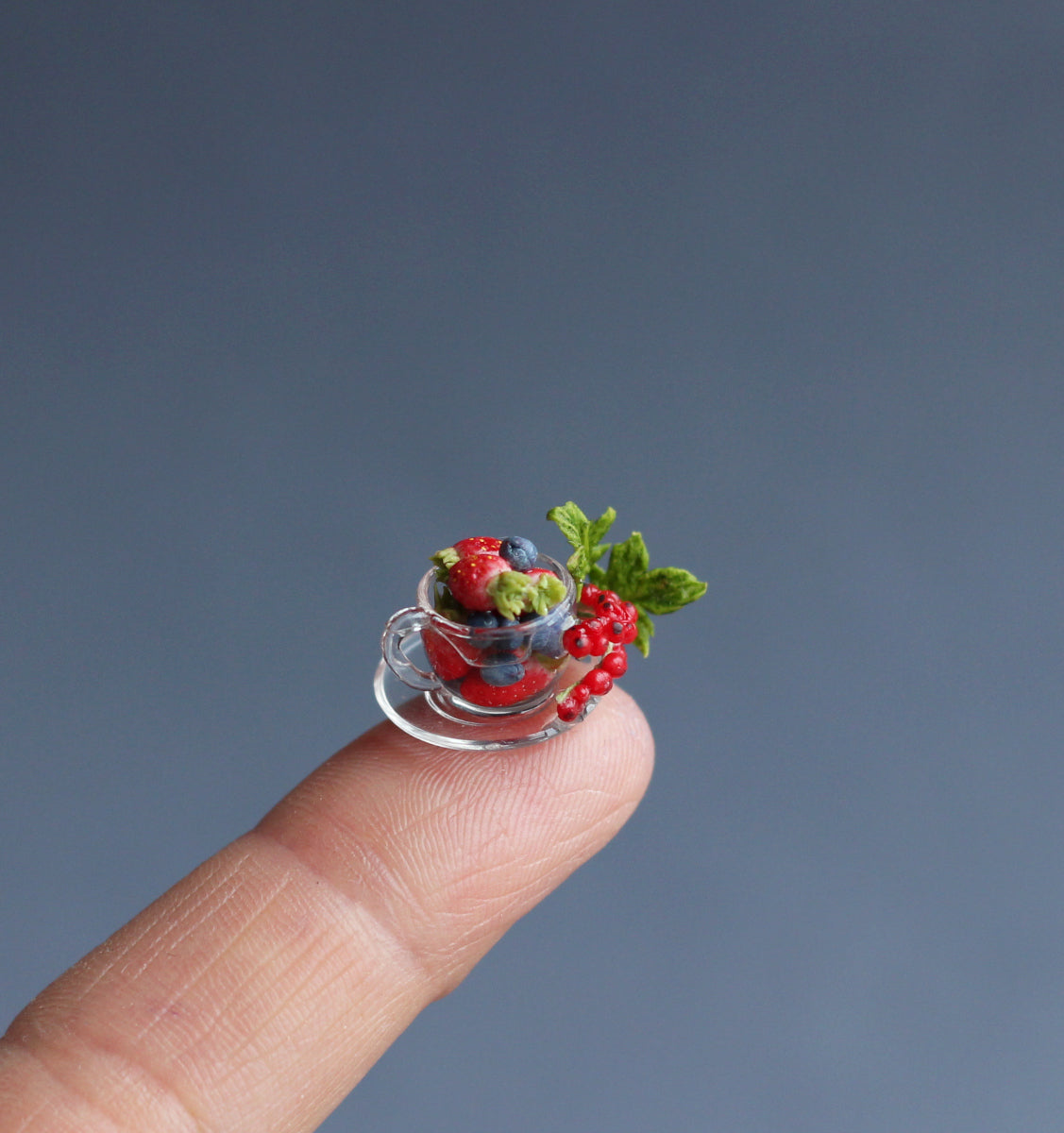 Glass tea pair: cup and candy bowl with berries. Miniature 1:12