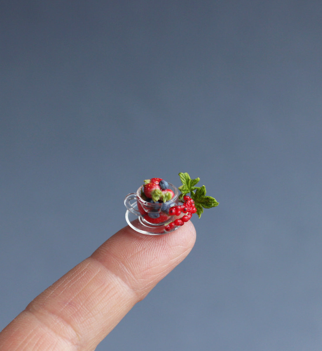 Glass tea pair: cup and candy bowl with berries. Miniature 1:12