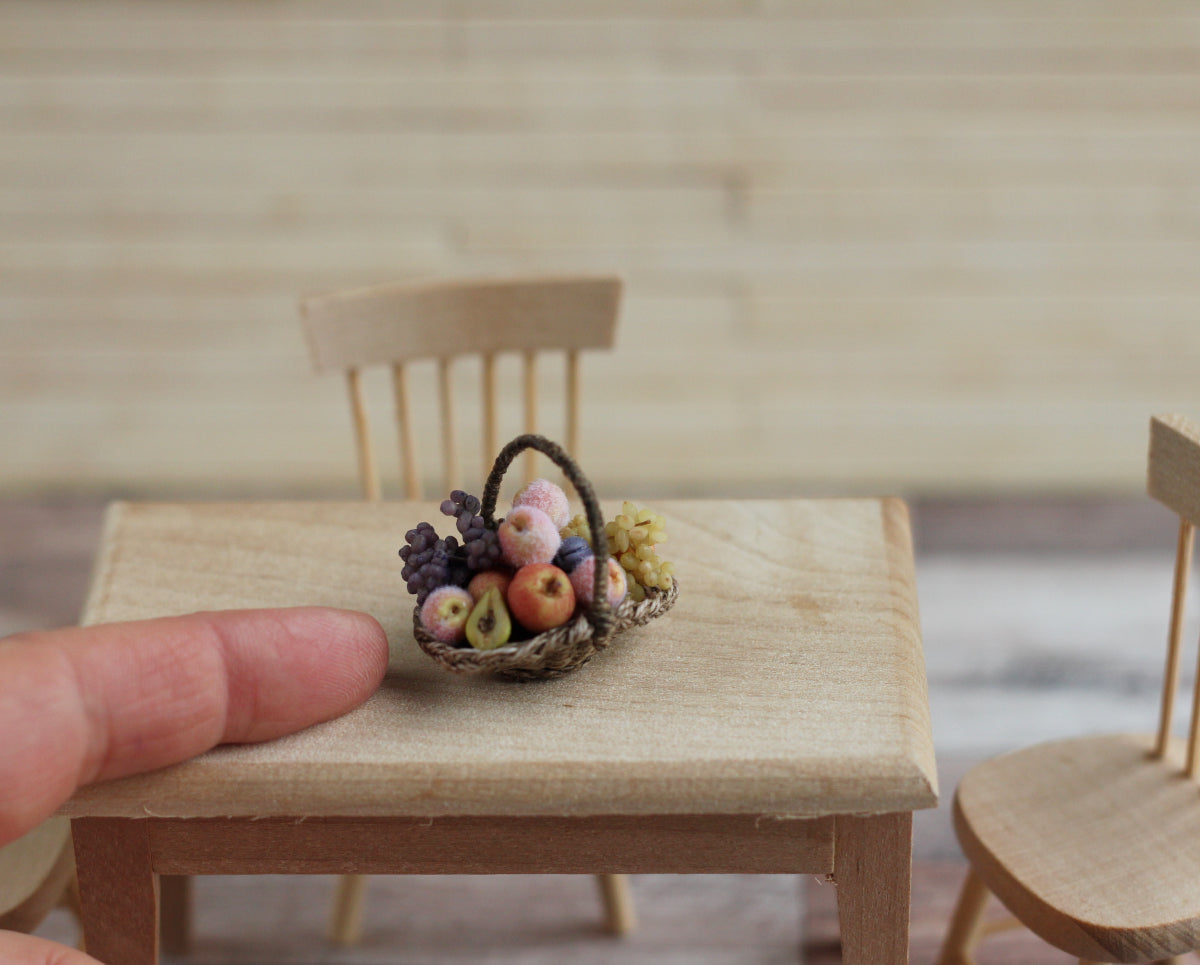 Wicker basket with fruit and grapes. Miniature 1:12