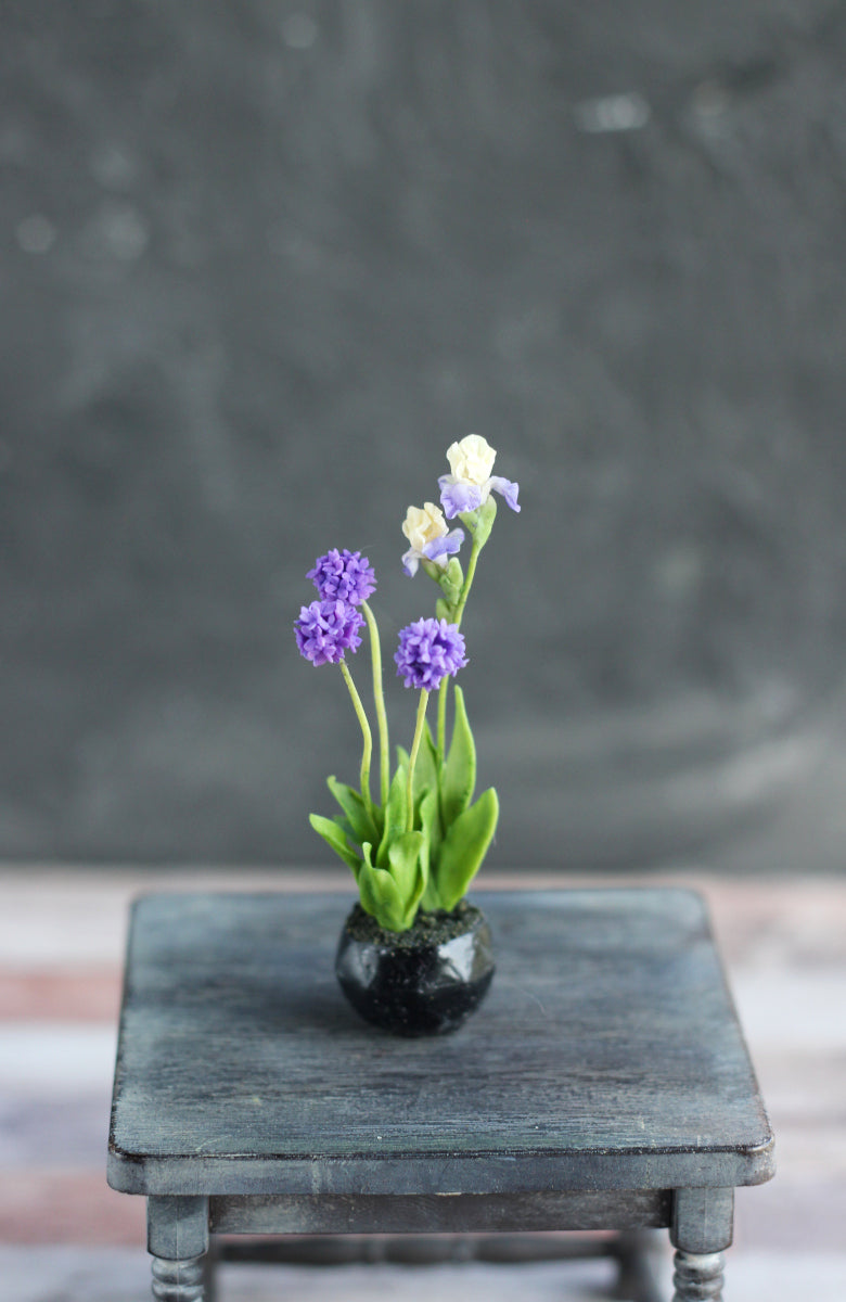 irises and ornamental onions in a decorative cachepot 1:12