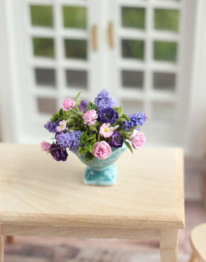 Large summer bouquet with lilacs and roses