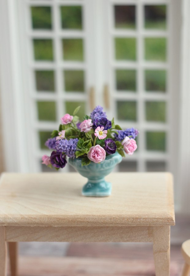 Large summer bouquet with lilacs and roses